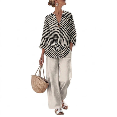 Completo Donna con Blusa a Righe e Pantaloni a Gamba Larga 1