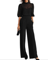 Completo da donna con top a collo alto trasparente e pantaloni a gamba larga 1