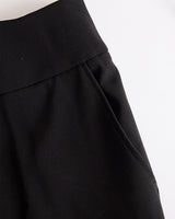 Completo da donna con top a collo alto trasparente e pantaloni a gamba larga 5