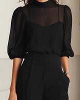 Completo da donna con top a collo alto trasparente e pantaloni a gamba larga 7