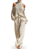Completo donna con maglione a spalle scoperte e pantaloni a gamba larga 1