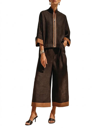 Completo due pezzi da donna con top con zip frontale e pantaloni a gamba larga 1