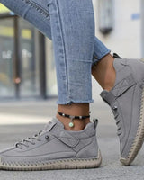 Sneakers basse stringate da donna con cinturino laterale 18
