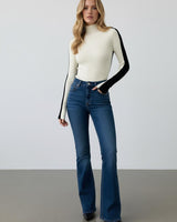 Top a maniche lunghe a coste con collo alto da donna 11