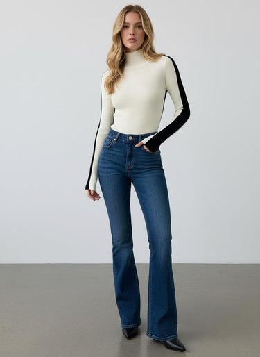 Top a maniche lunghe a coste con collo alto da donna 11