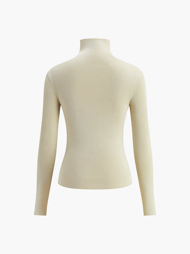 Top a maniche lunghe a coste con collo alto da donna 9