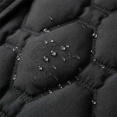 Cappotto imbottito lungo da donna con cappuccio e trapuntatura geometrica 8