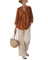 Completo Donna con Blusa a Righe e Pantaloni a Gamba Larga 4