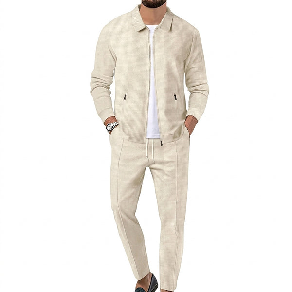 Completo coordinato da uomo con giacca con zip e pantaloni testurizzati 1