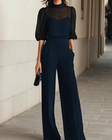 Completo da donna con top a collo alto trasparente e pantaloni a gamba larga 3
