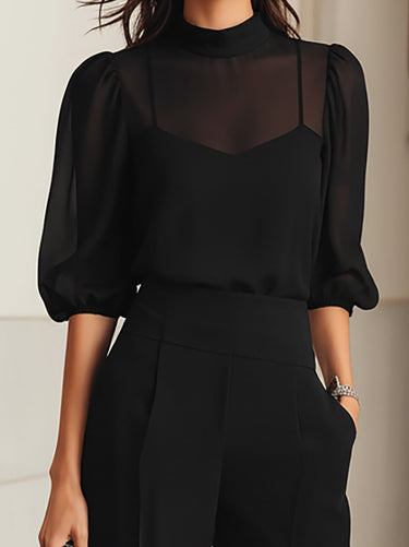 Completo da donna con top a collo alto trasparente e pantaloni a gamba larga 7