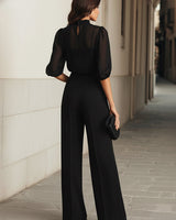 Completo da donna con top a collo alto trasparente e pantaloni a gamba larga 9