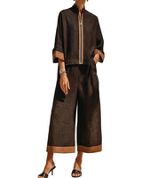 Completo due pezzi da donna con top con zip frontale e pantaloni a gamba larga 1