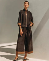 Completo due pezzi da donna con top con zip frontale e pantaloni a gamba larga 2