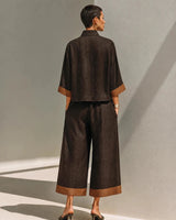 Completo due pezzi da donna con top con zip frontale e pantaloni a gamba larga 4