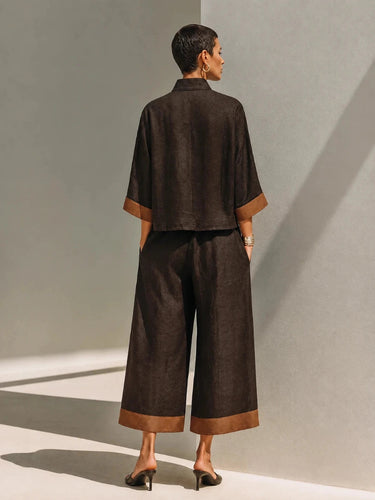 Completo due pezzi da donna con top con zip frontale e pantaloni a gamba larga 4