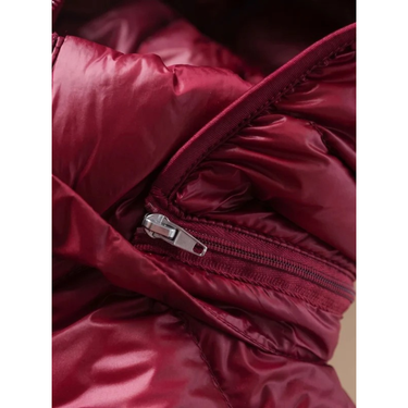 Piumino lungo da donna con cappuccio e chiusura a zip 9