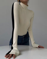 Top a maniche lunghe a coste con collo alto da donna 6