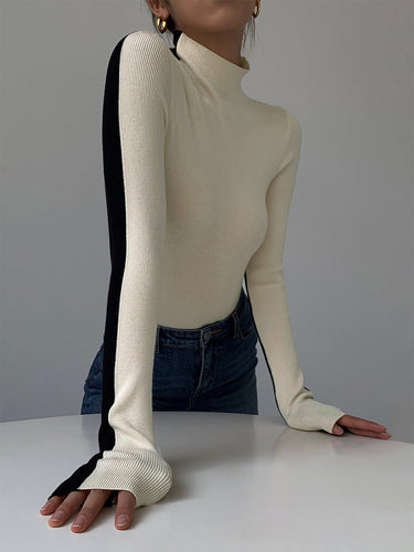Top a maniche lunghe a coste con collo alto da donna 6