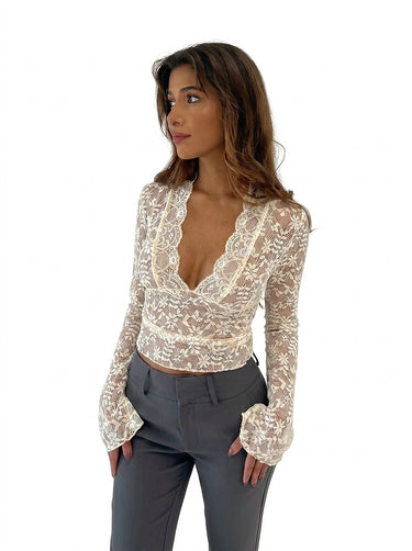 Top da donna in pizzo a maniche lunghe con scollo a V 1